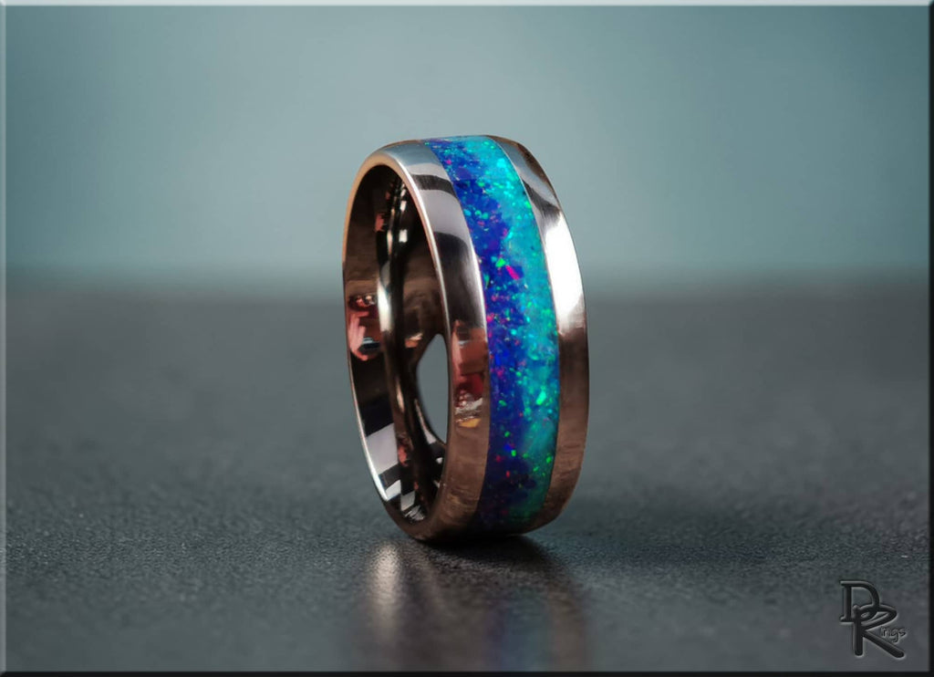 DR Rings titanium ring with opal featuring a blue-green opal inlay and polished metal band