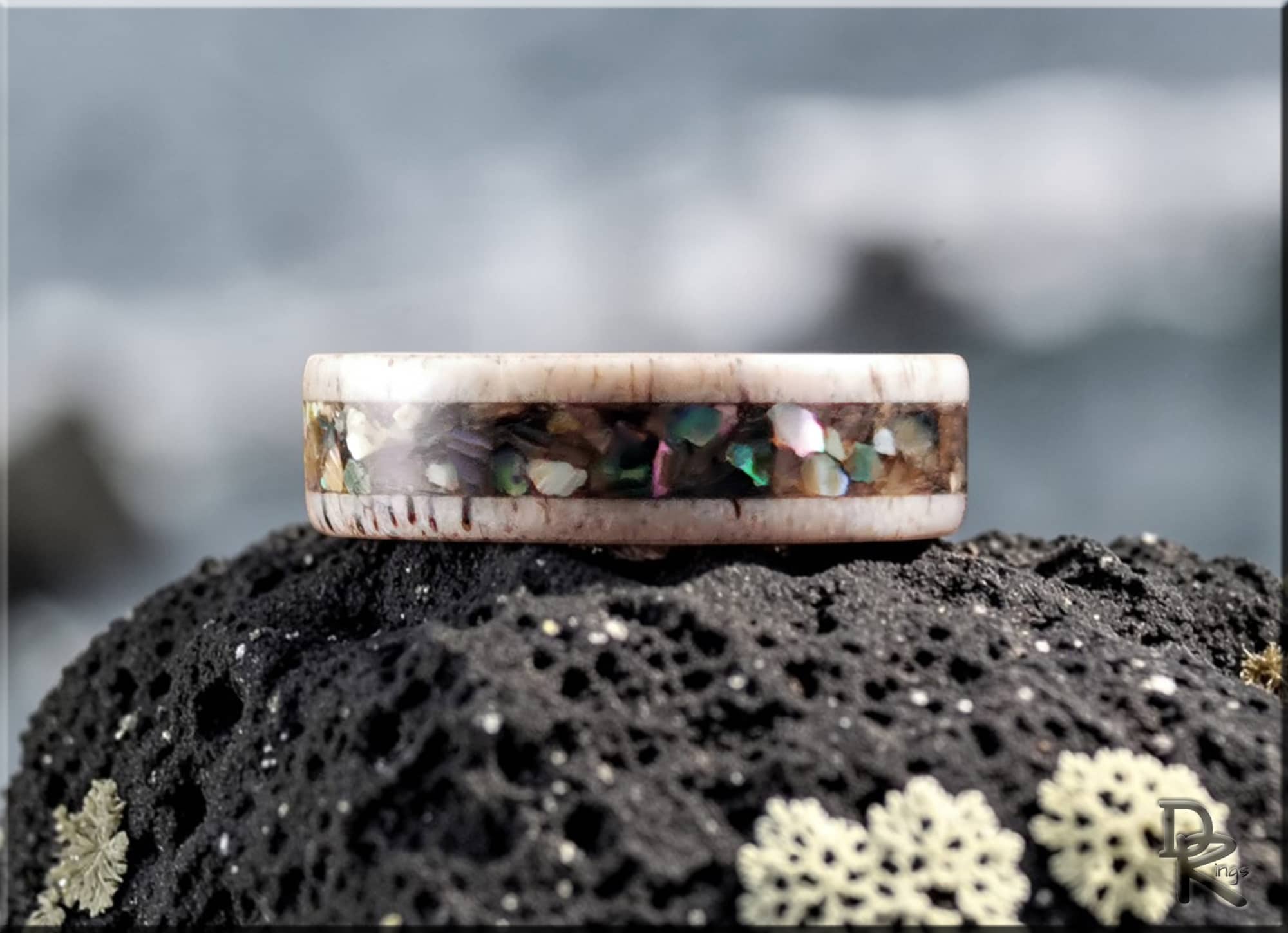 DR Rings antler ring with abalone inlay featuring natural earthy tones and iridescent colors