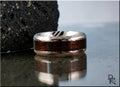 Damascus steel ring with wood inlay by DR Rings featuring intricate metal patterns and polished wood center