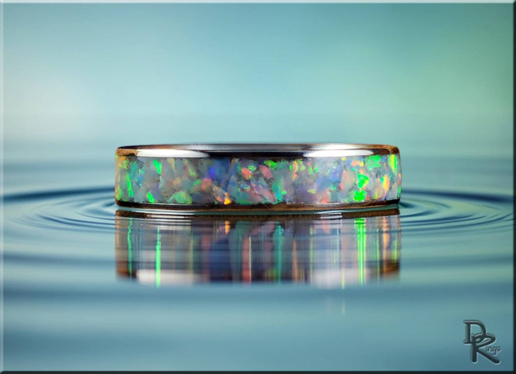 Narrow titanium ring with opal featuring colorful iridescent inlay and polished finish by DR Rings