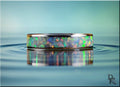 Narrow titanium ring with opal featuring colorful iridescent inlay and polished finish by DR Rings