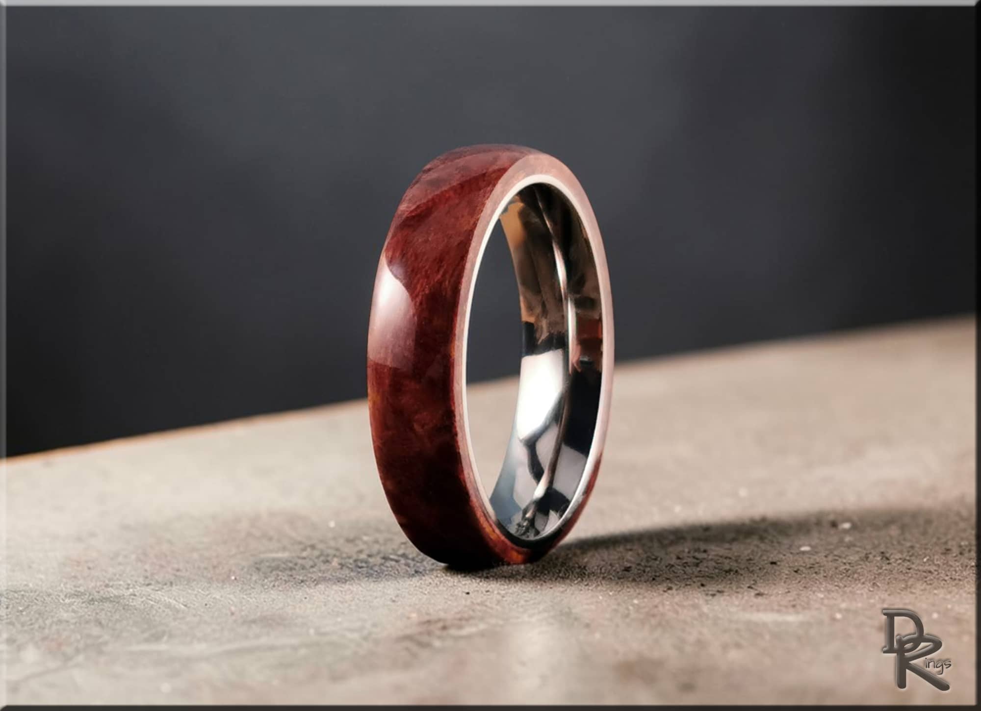 Redwood ring on titanium with polished wood grain exterior and shiny metal interior by DR Rings