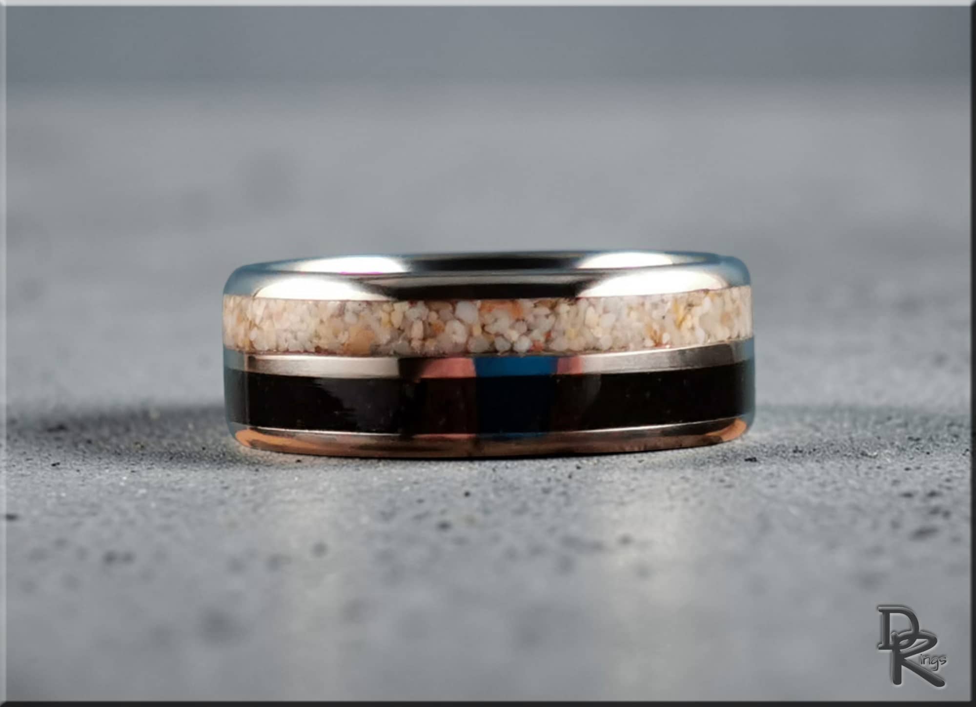 DR Rings titanium ring with dual sand inlays featuring a silver band and contrasting textures