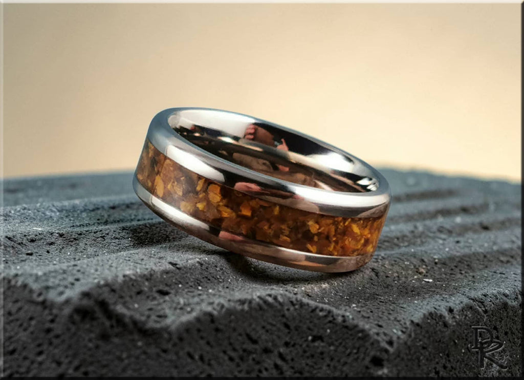 DR Rings titanium ring with inlay featuring a polished metal band and amber stone inlay