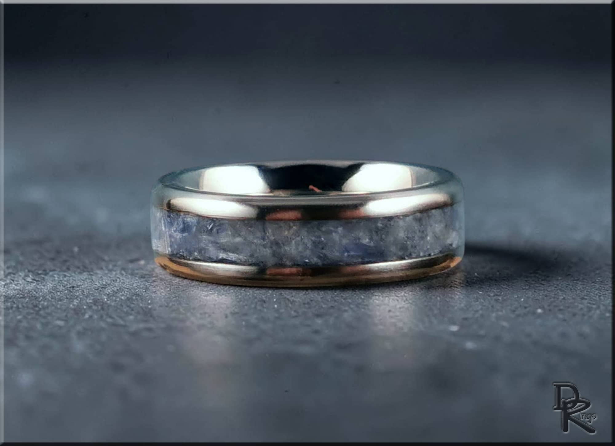 DR Rings titanium ring with kyanite band featuring a polished silver and blue stone inlay design