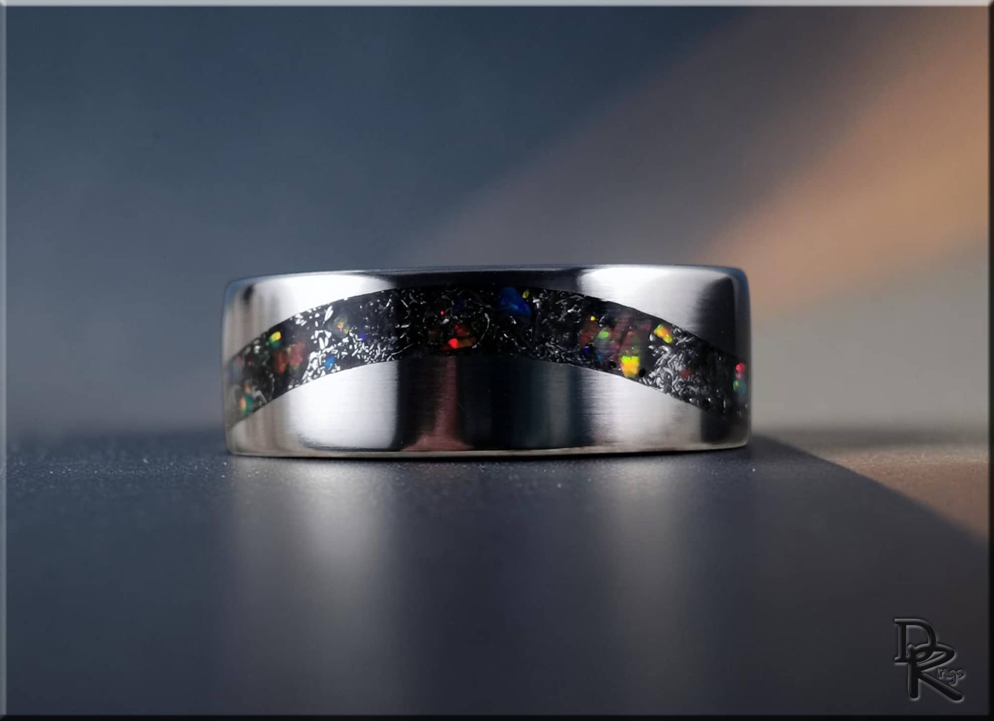 DR Rings titanium smart ring with a sleek silver band and colorful inlay design