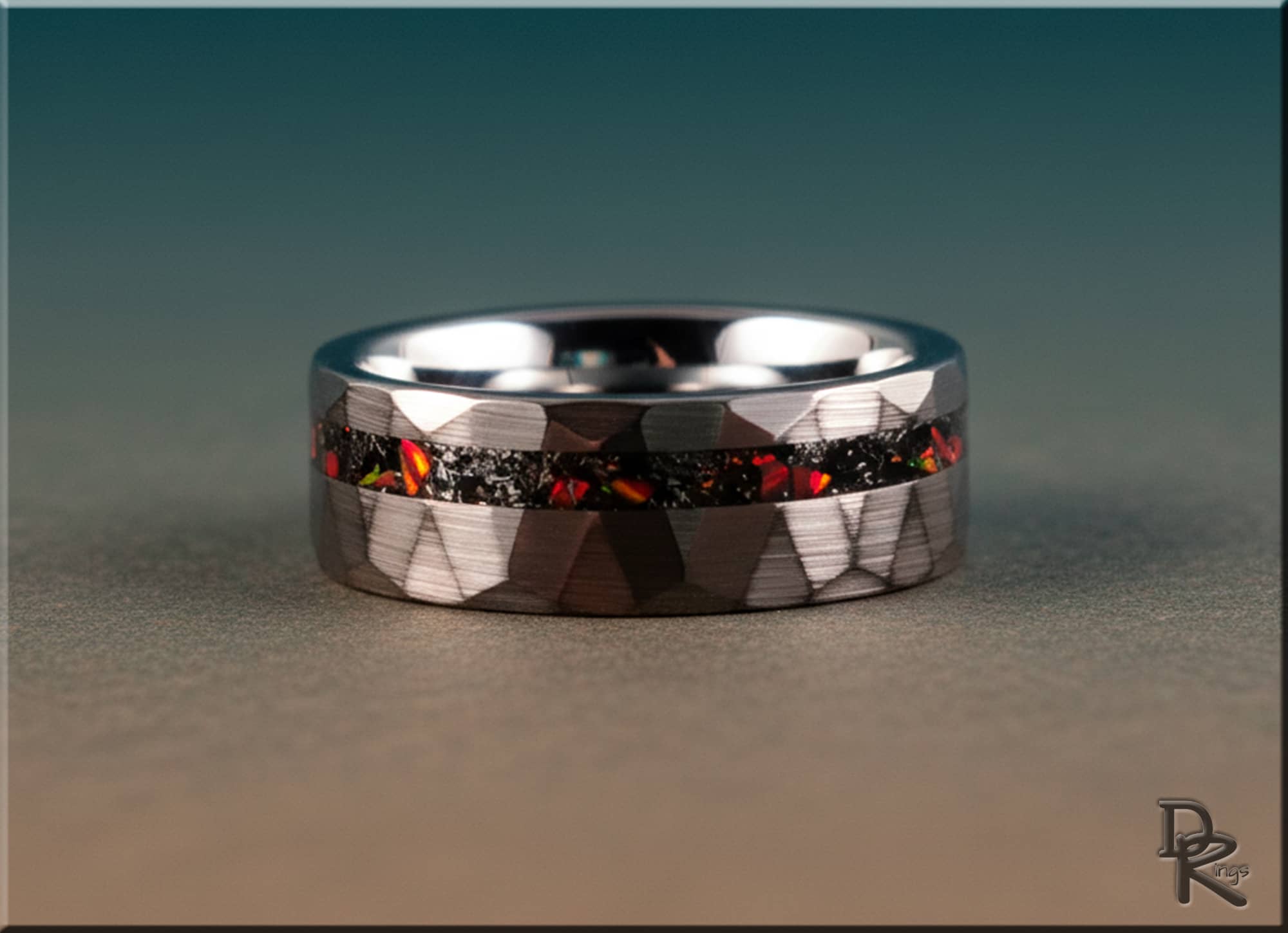 DR Rings tungsten as a ring with faceted silver band and embedded red and black stone inlay