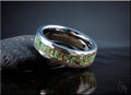 DR Rings tungsten as a ring with green stone inlay and polished silver finish on dark surface