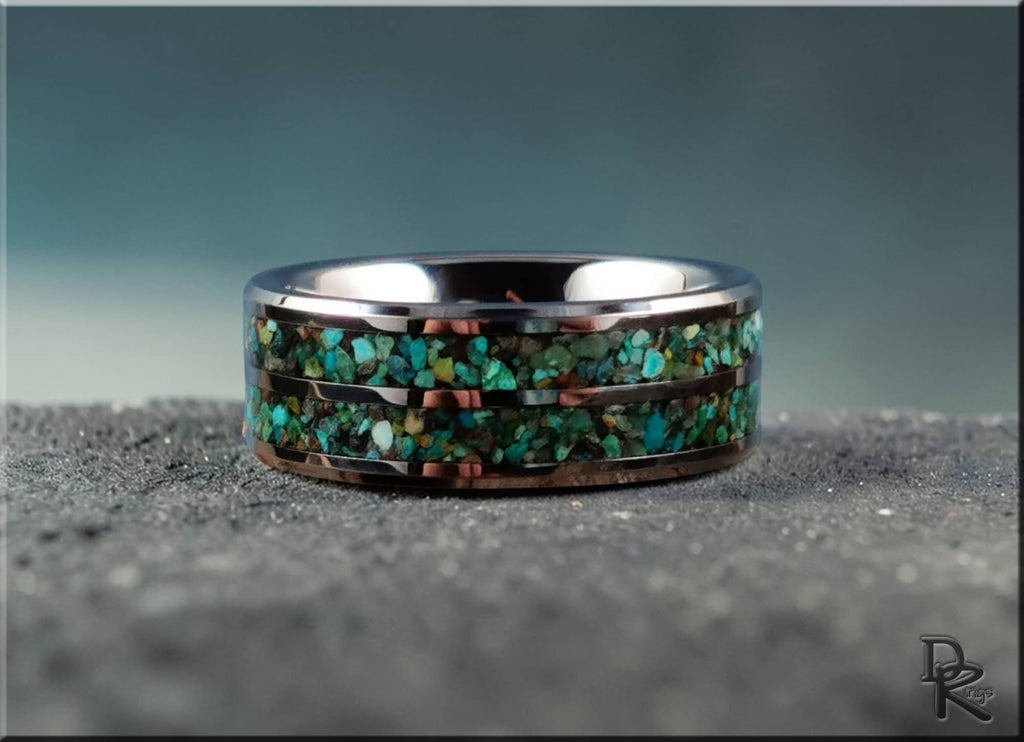 Tungsten carbide ring with two inlays featuring green and blue stone fragments by DR Rings