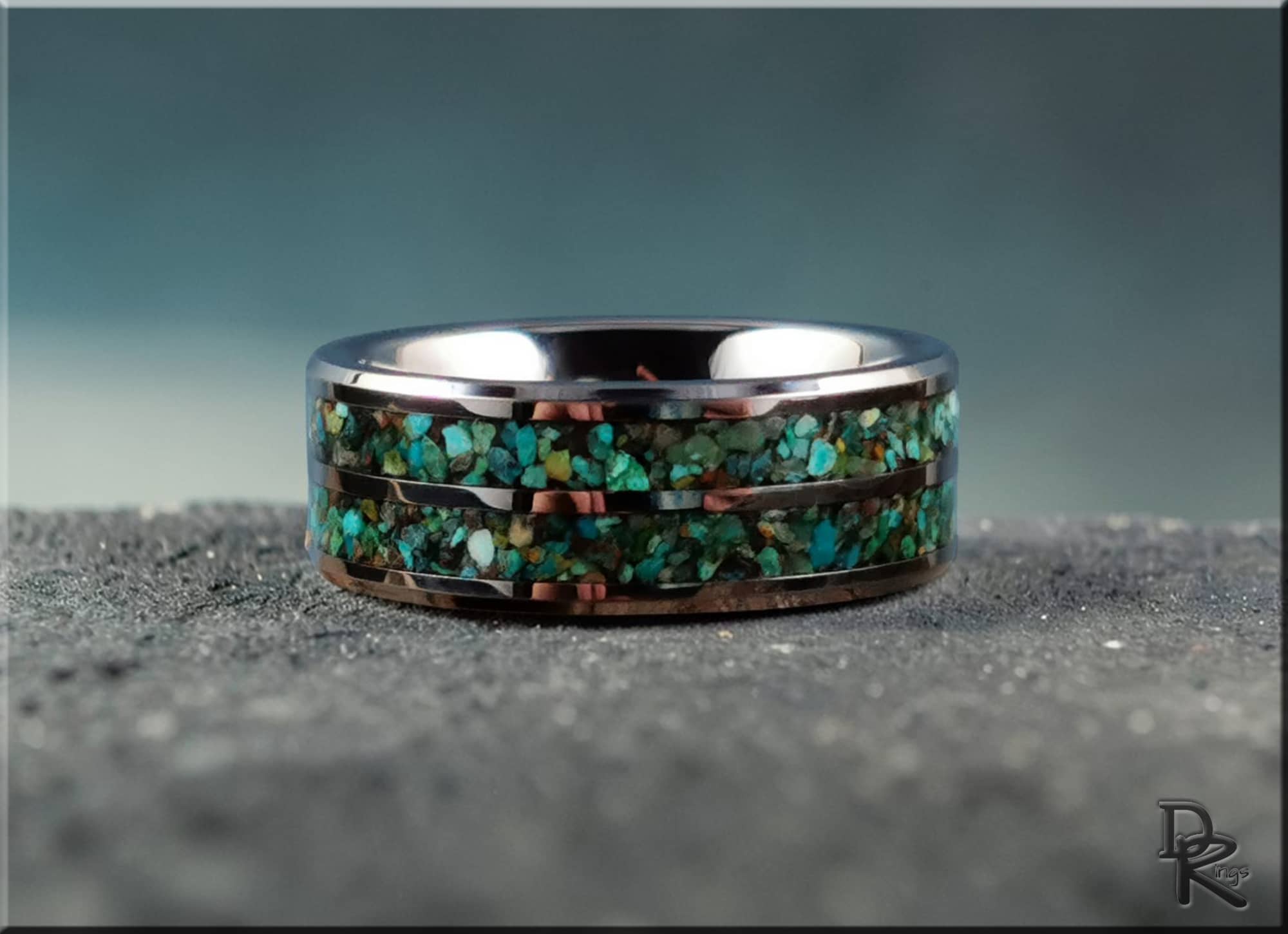 Tungsten carbide ring with two inlays featuring green and blue stone fragments by DR Rings