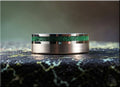 DR Rings tungsten ring carbide with green inlay on textured surface background
