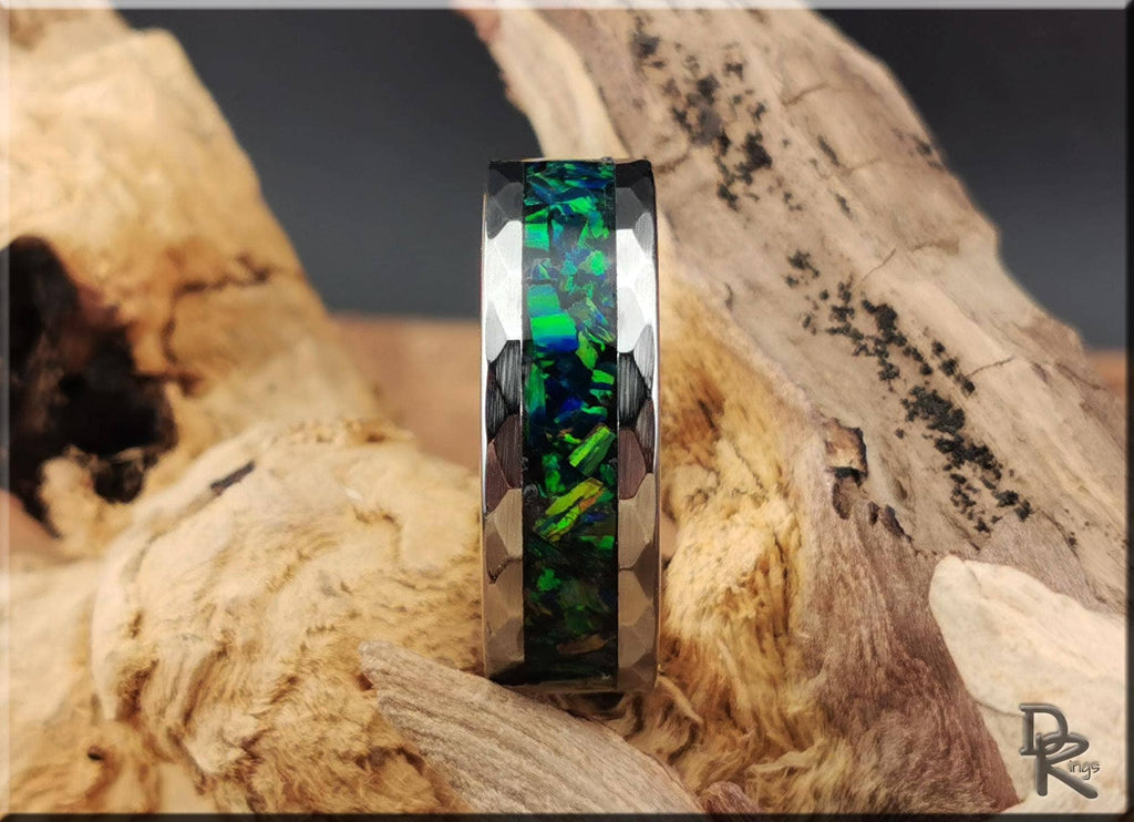 DR Rings tungsten ring with green opal channel in polished silver tone on rustic wood background