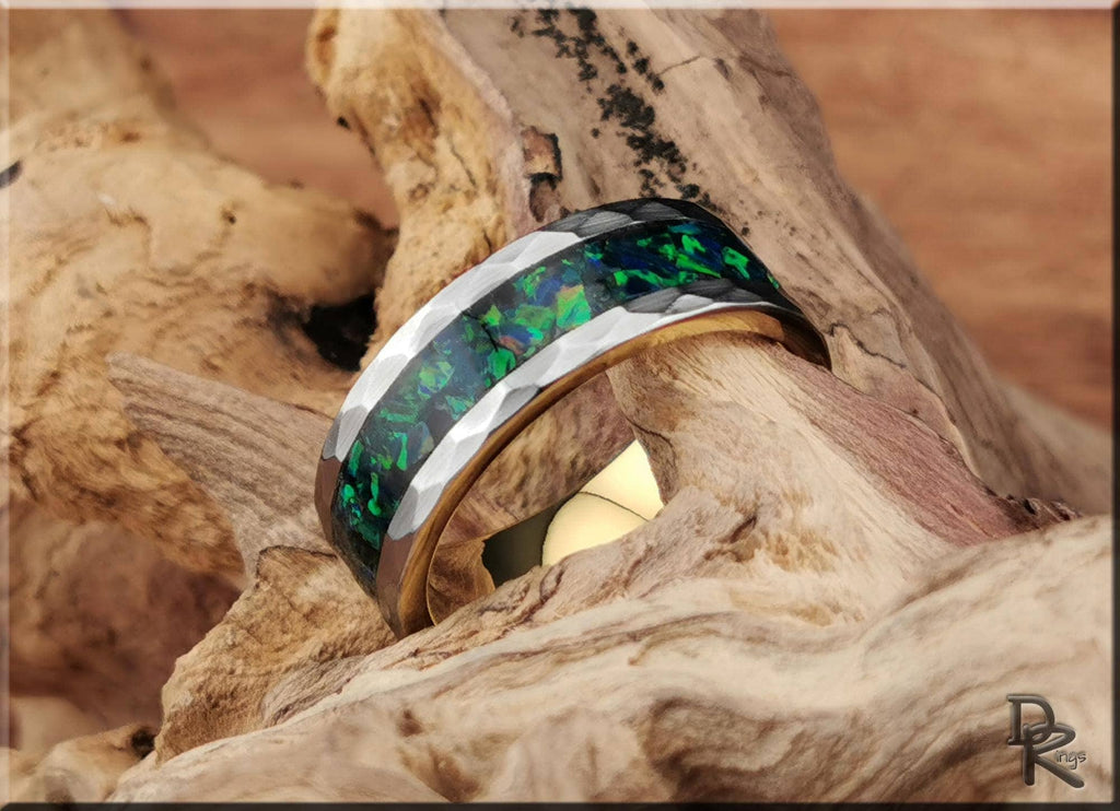 DR Rings tungsten ring with green opal inlay and hammered silver edges on rustic wood background