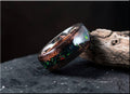DR Rings wood ring with opal inlay featuring dark wood and vibrant multicolor opal accents
