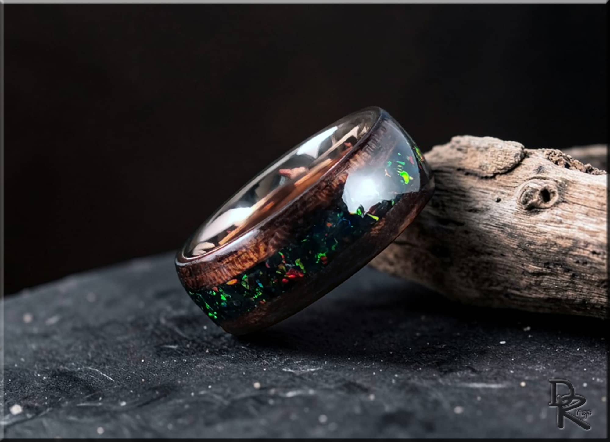 DR Rings wood ring with opal inlay featuring dark wood and vibrant multicolor opal accents