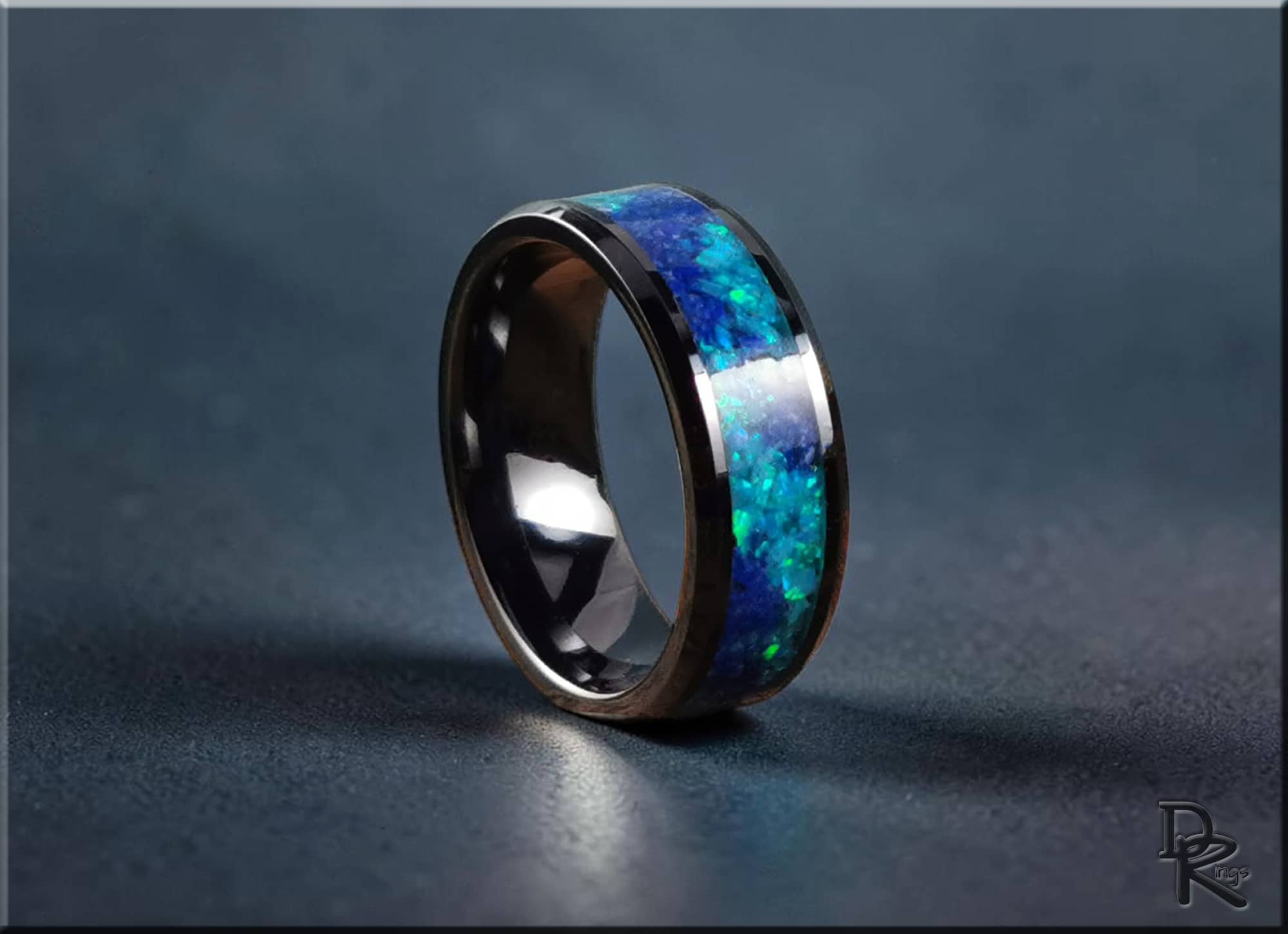 DR Rings ceramic ring with glow inlay featuring blue and green glowing accents on black band