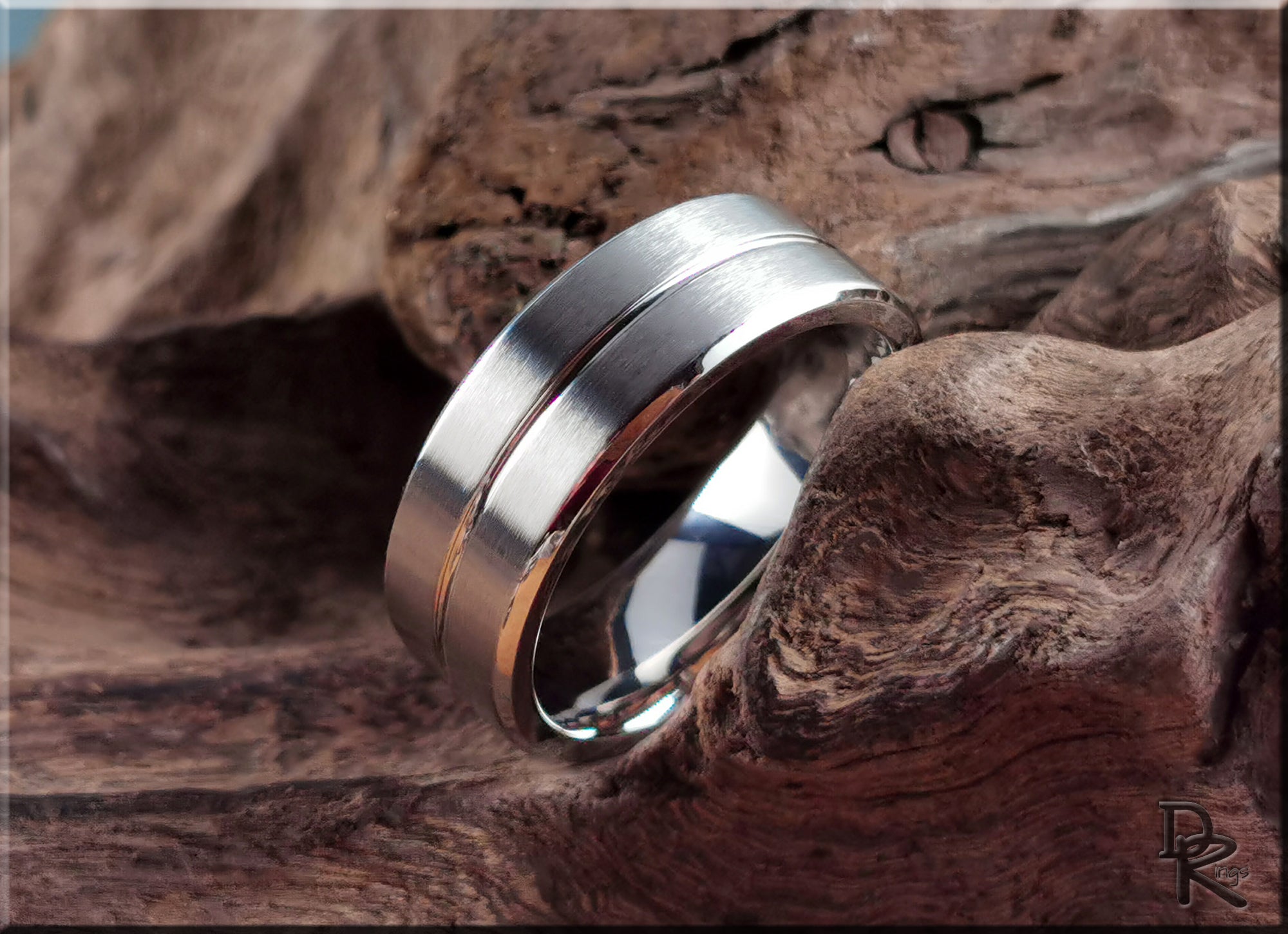 DR Rings sleek silver cobalt ring with matte and polished finish on rustic wood background