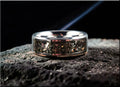 DR Rings tungsten ring with meteorite inlay featuring a polished silver band and textured meteorite center