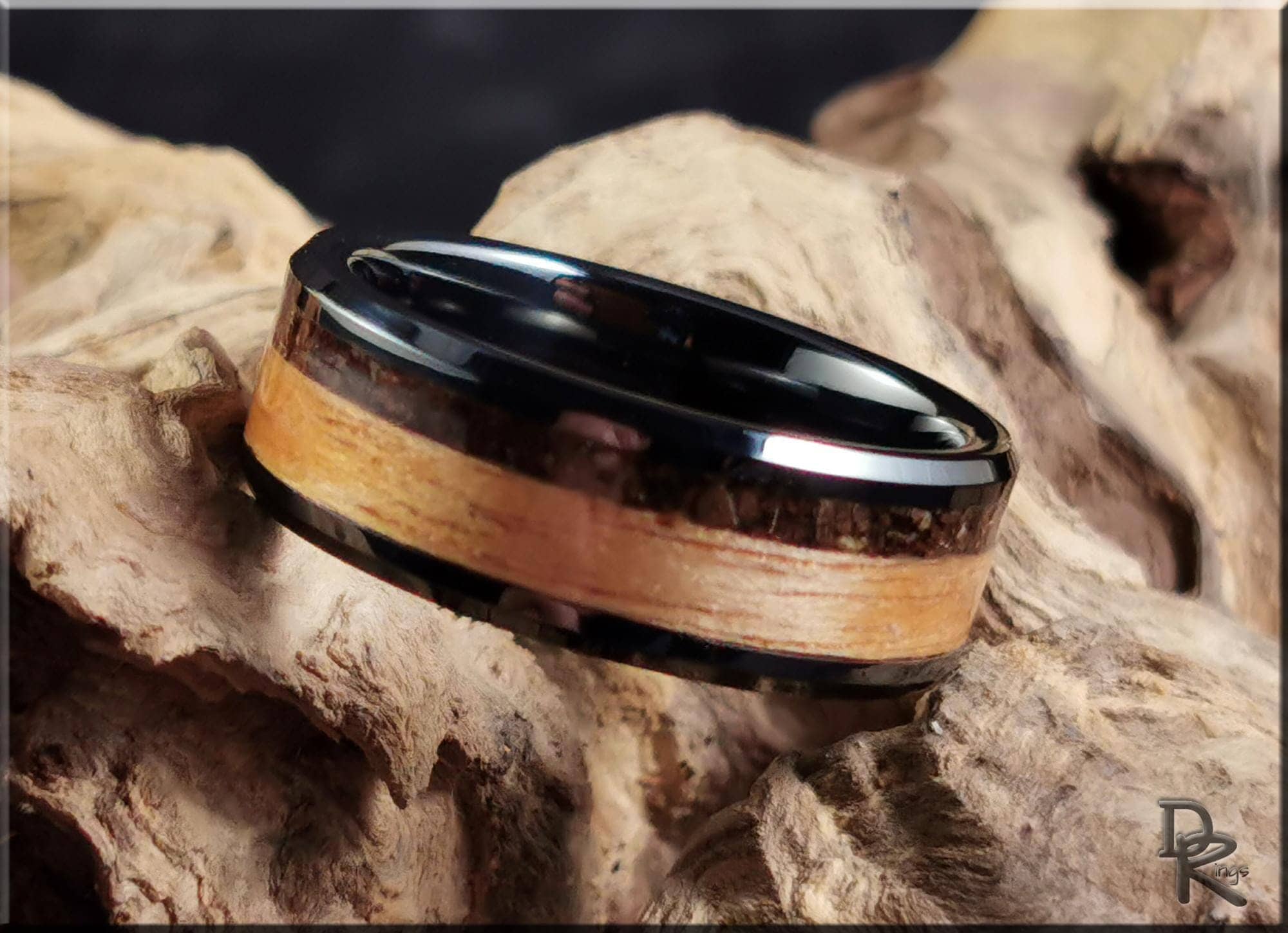Black Ceramic Ring with Rustic Chestnut and Velociraptor Dinosaur bone inlays