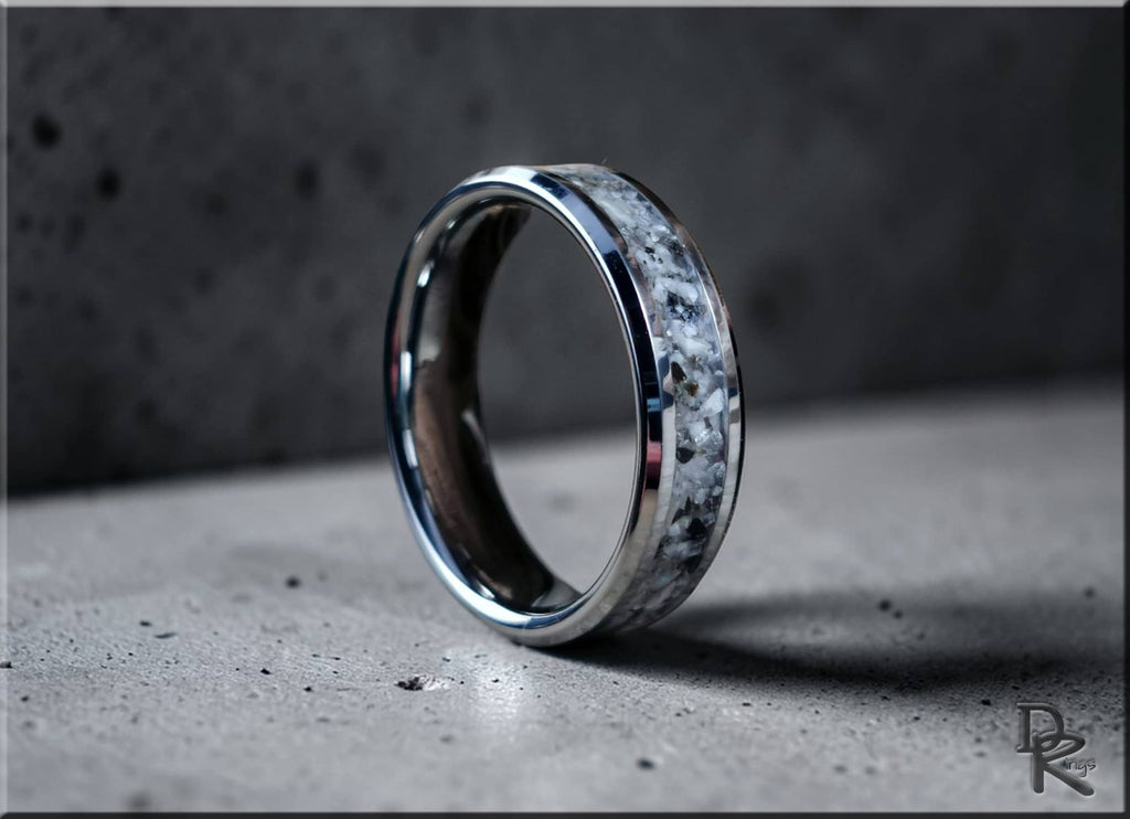 Tungsten ring with moonstone inlay featuring a polished silver edge and speckled gray pattern