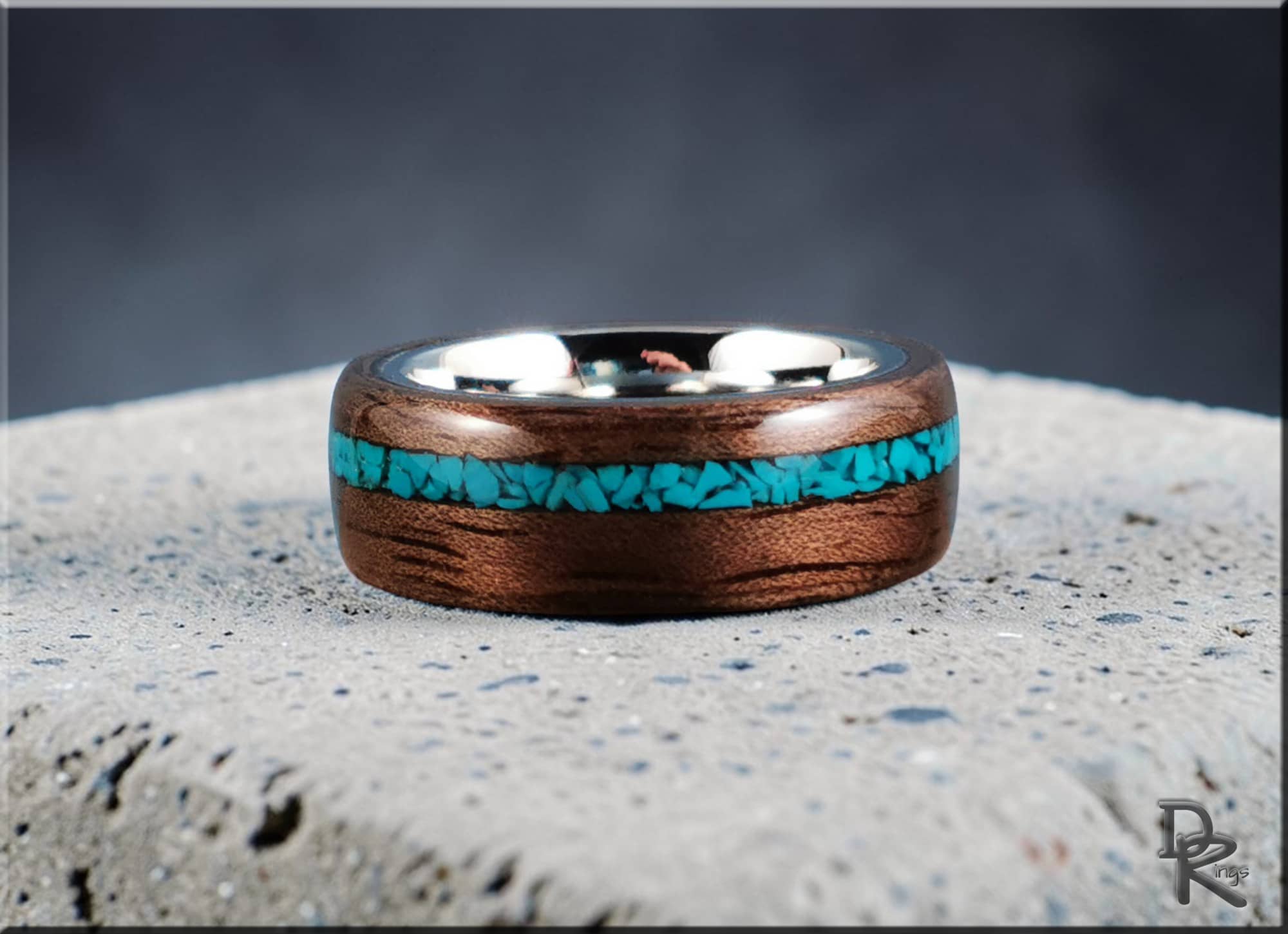Walnut ring with turquoise inlay featuring polished wood and vibrant blue stones by DR Rings