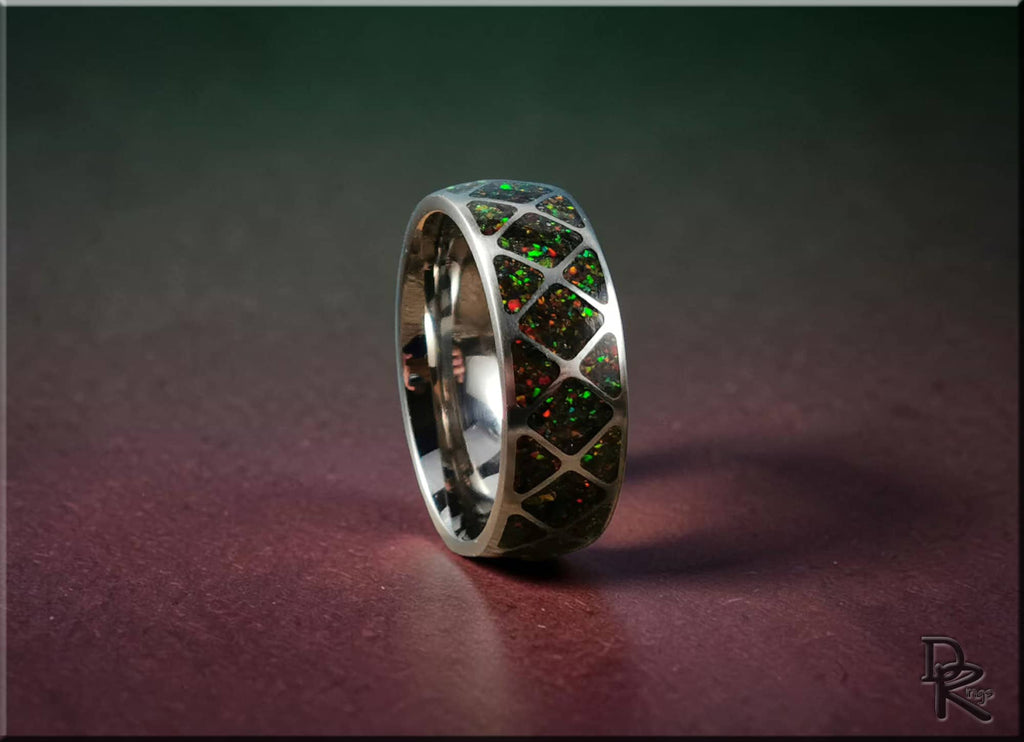 DR Rings titanium ring with opal inlay featuring multicolored green and red opal accents in silver band