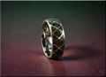 DR Rings titanium ring with opal inlay featuring multicolored green and red opal accents in silver band