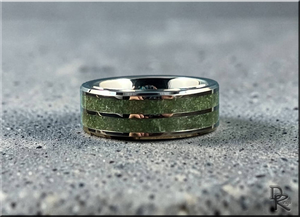 Tungsten ring carbide with emerald inlay by DR Rings featuring polished silver edges and green stone center