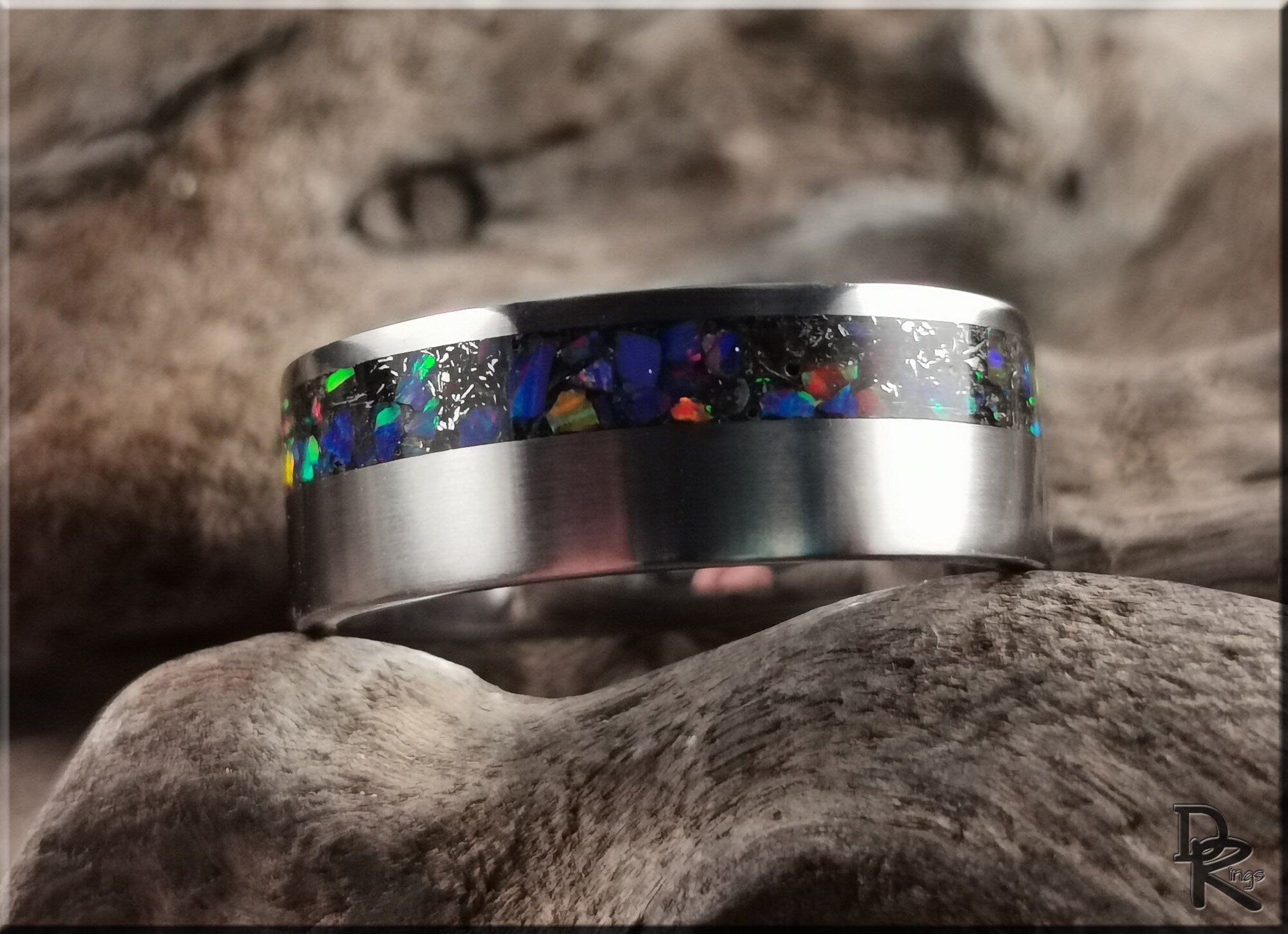 DR Rings titanium ring with meteorite inlay featuring colorful, iridescent design with brushed finish