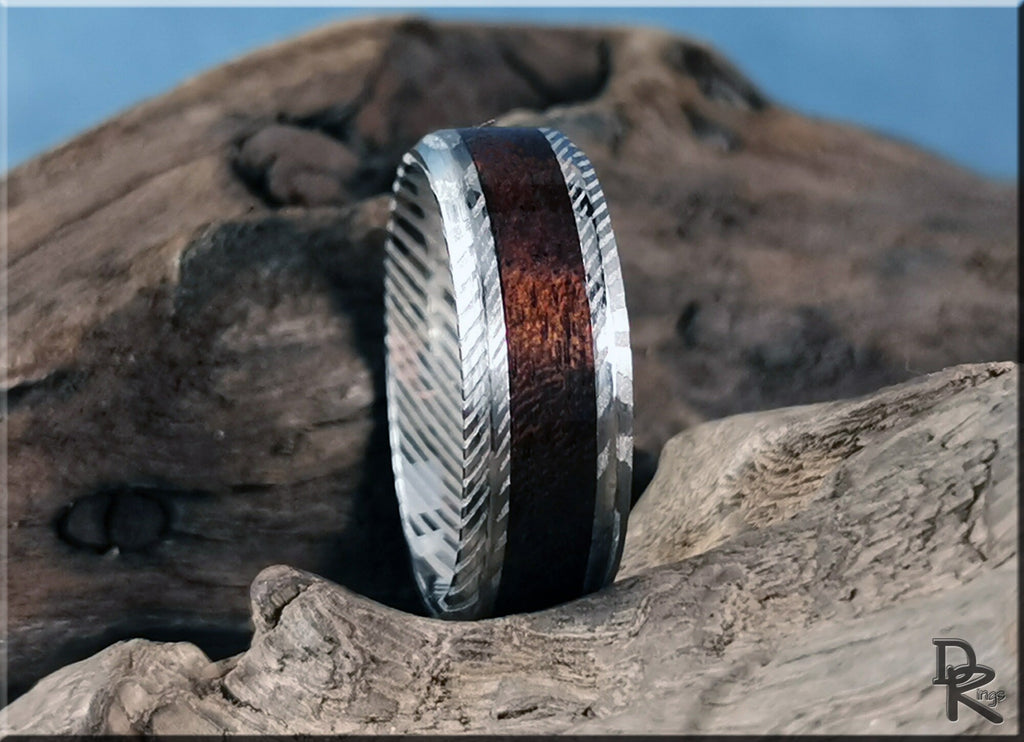 DR Rings damascus steel ring with wood inlay featuring hammered and striped metal patterns