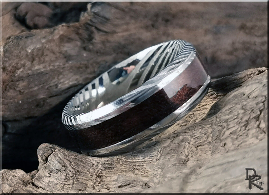 Damascus steel ring with wood inlay from DR Rings showcasing detailed metal pattern and smooth wood finish