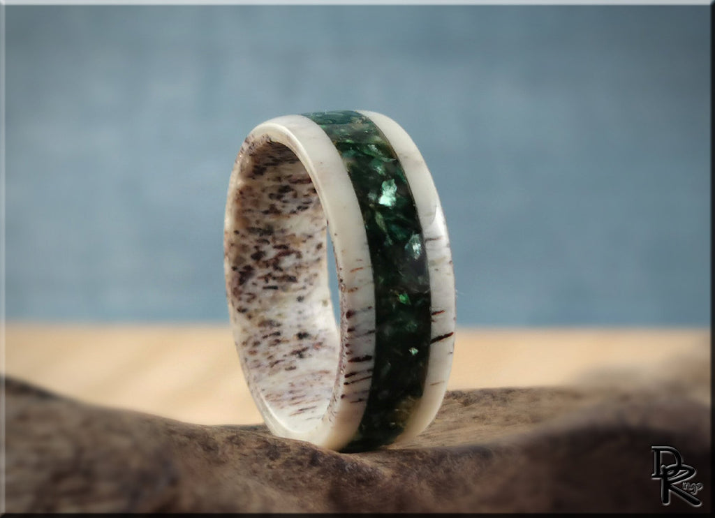 DR Rings antler ring with mica green inlay and natural texture on wooden surface