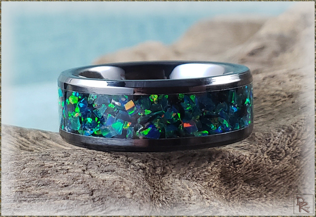 DR Rings ceramic ring with iridescent blue and green inlay on a black band