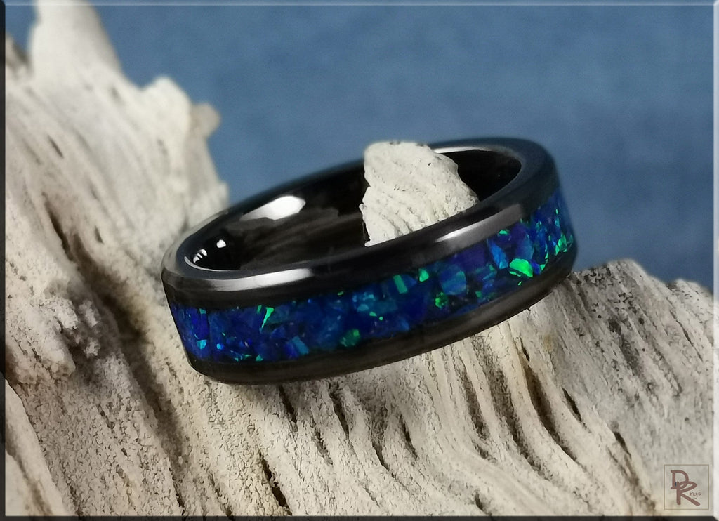 Black ceramic ring with inlay featuring blue and green opal design by DR Rings