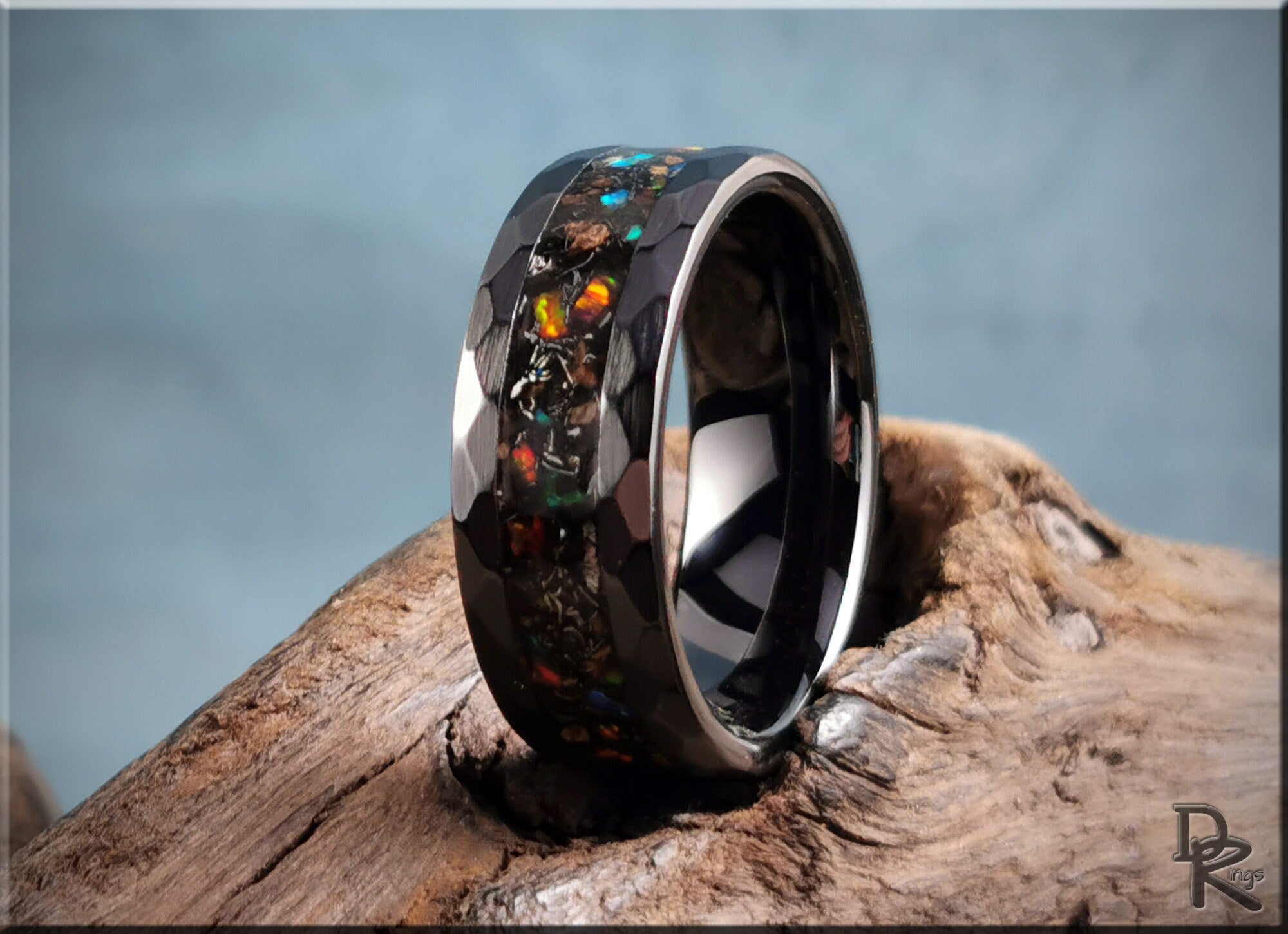 Hammered ceramic ring with inlay featuring colorful stones on dark textured band from DR Rings