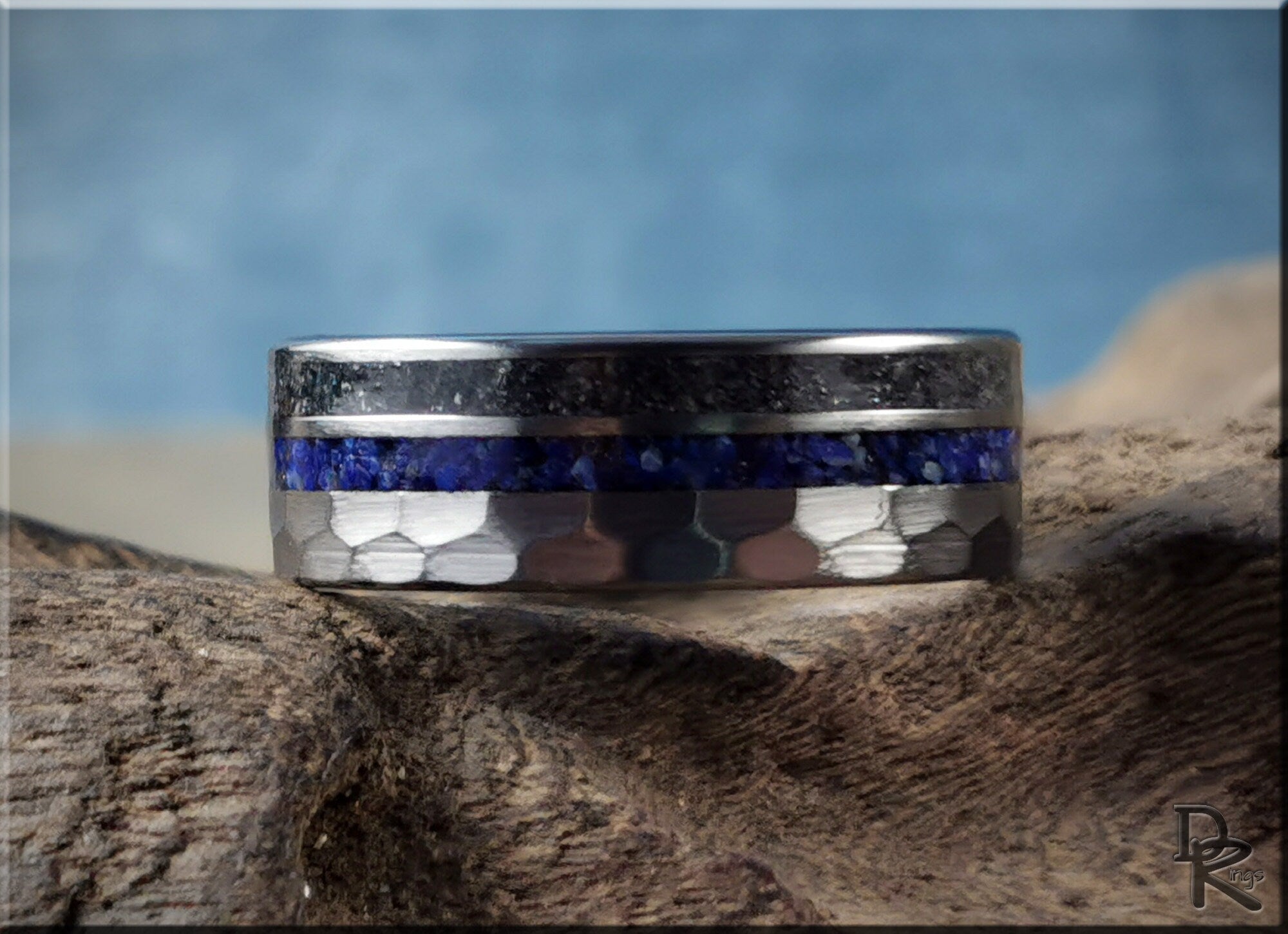Hammered tungsten ring with two inlays featuring black and blue stone embedded details by DR Rings
