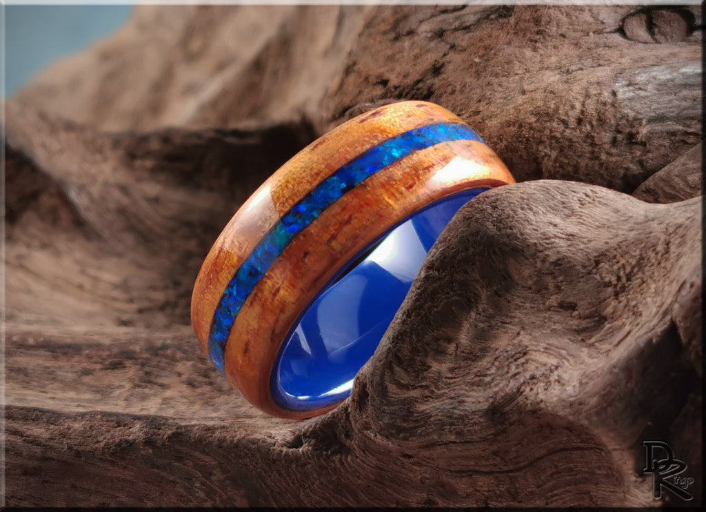 DR Rings koa wood ring with opal and ceramic featuring blue opal inlay and polished wood finish