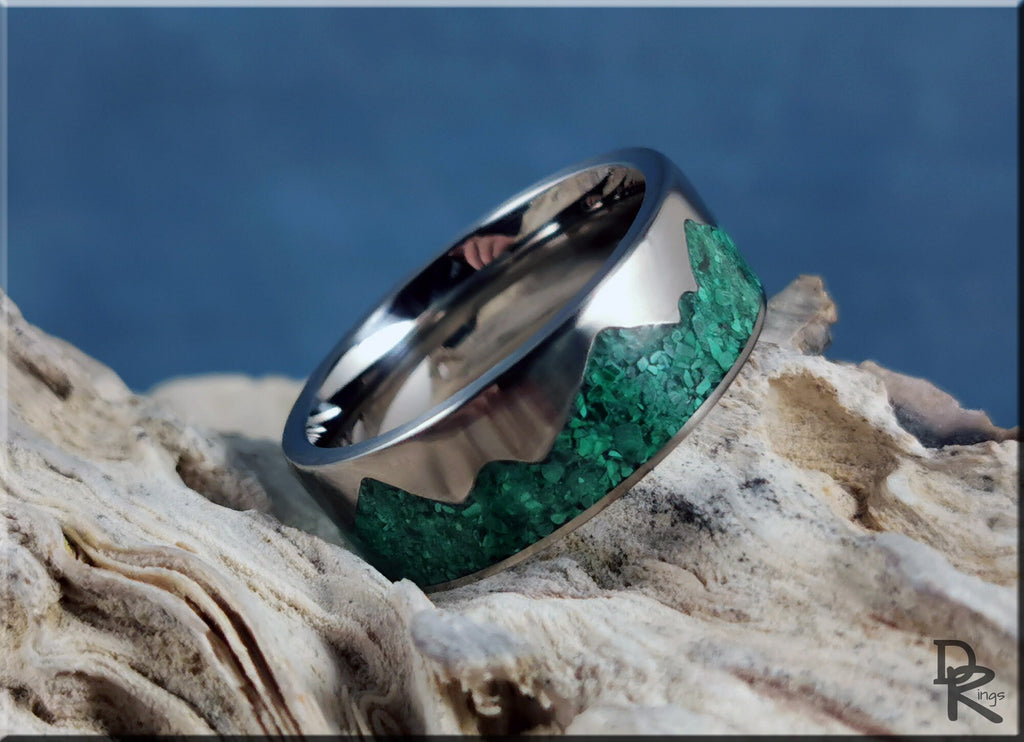 DR Rings titanium mountain ring with malachite inlaid green stone design on textured background