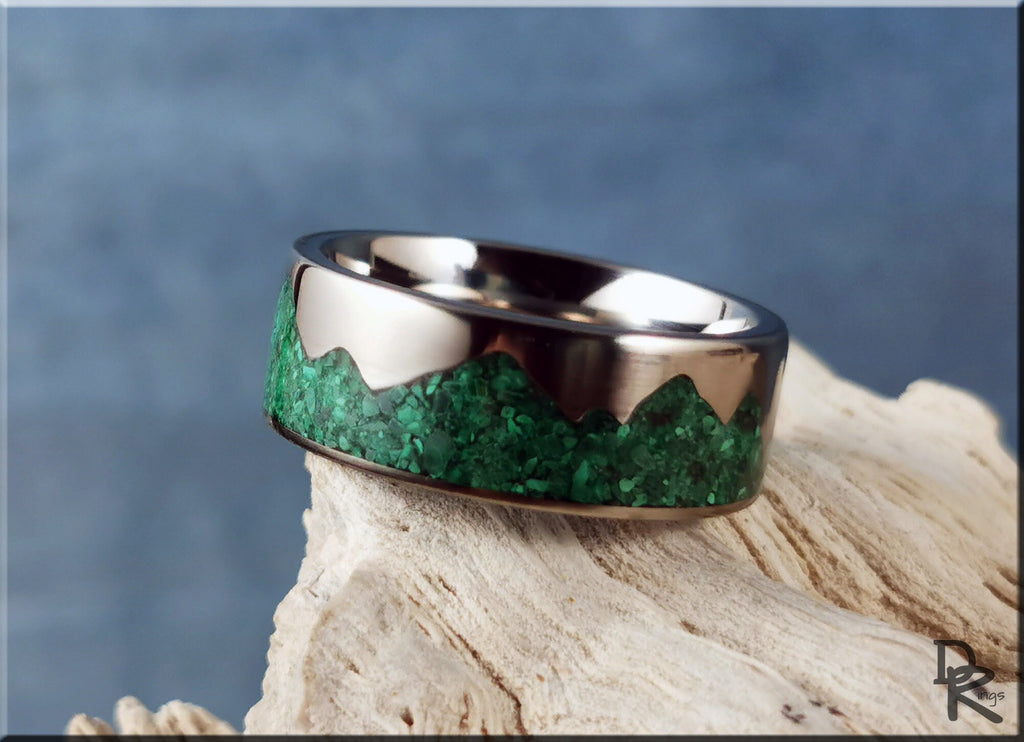 DR Rings titanium mountain ring with malachite green gemstone inlay on wooden surface