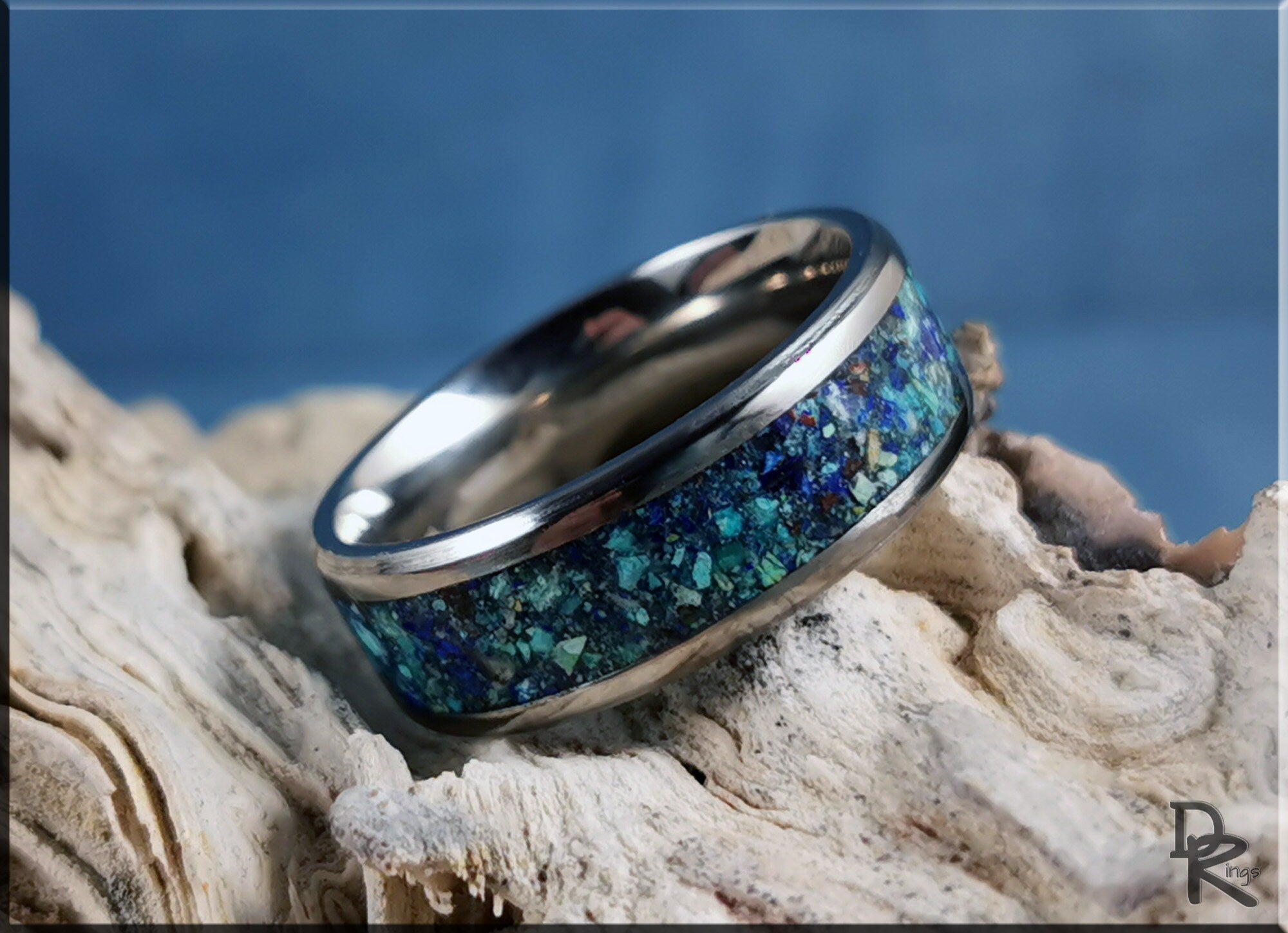 DR Rings titanium ring with azurite inlay on textured natural wood background