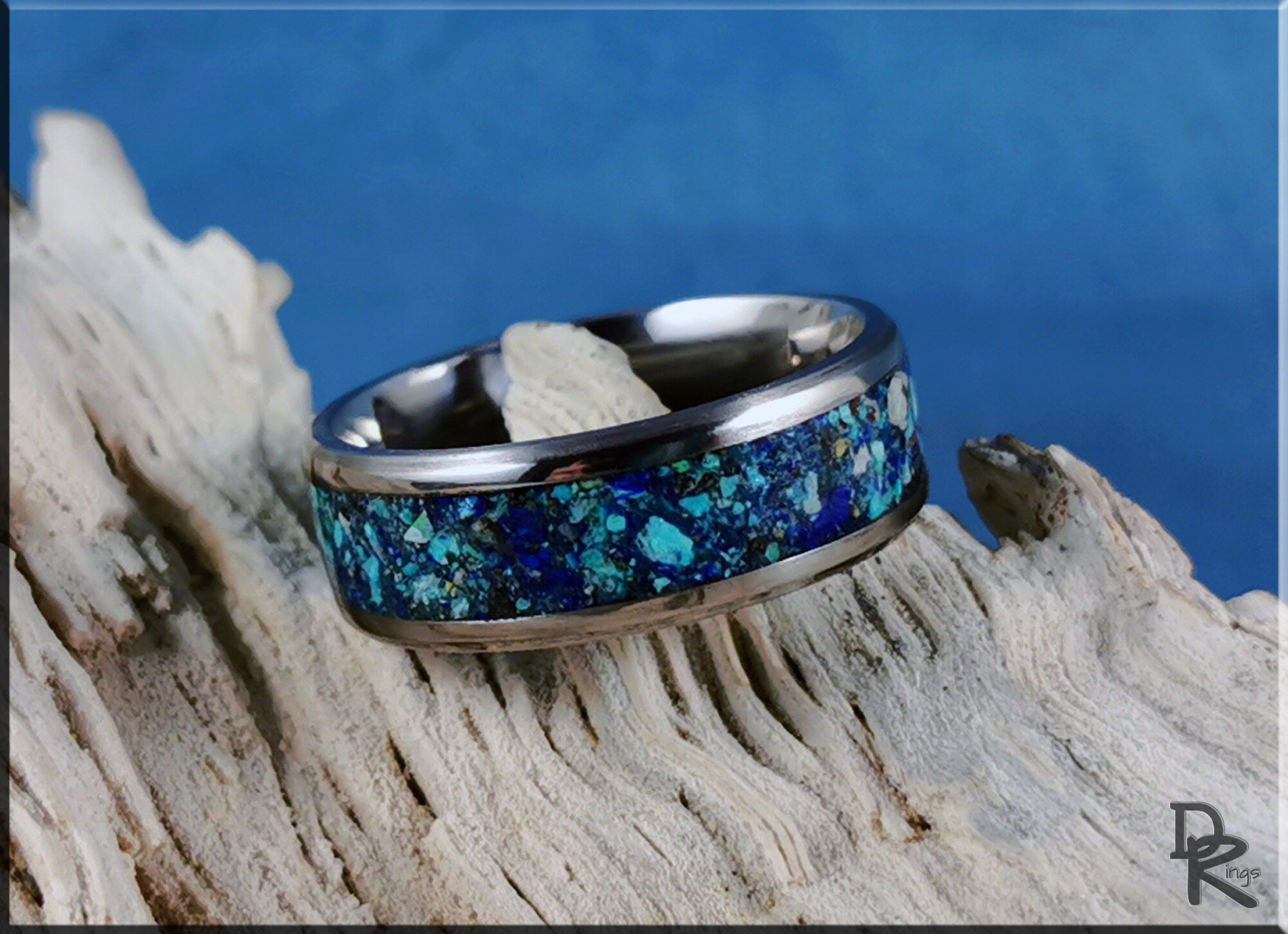 DR Rings titanium ring with azurite inlay featuring blue and green stone detail on wood