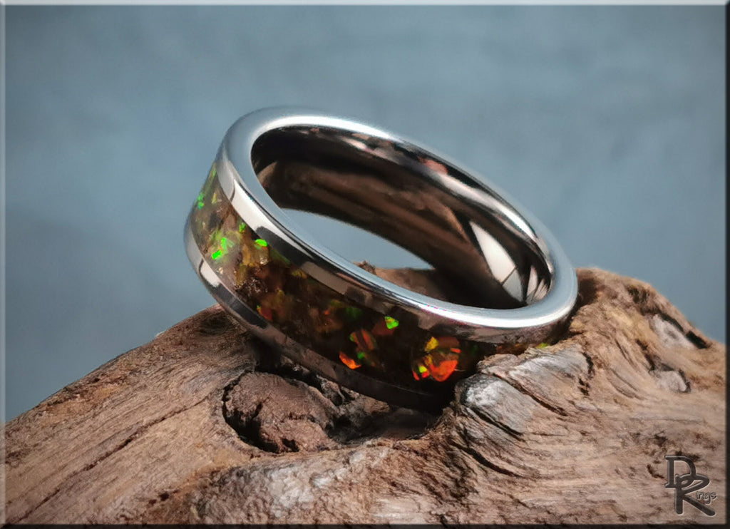 DR Rings titanium ring with inlay featuring a colorful opal-like design on a polished silver band