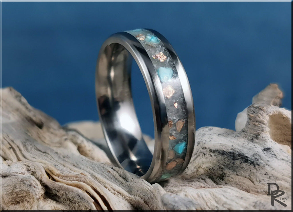 DR Rings titanium ring with inlay featuring turquoise and copper flakes on natural driftwood