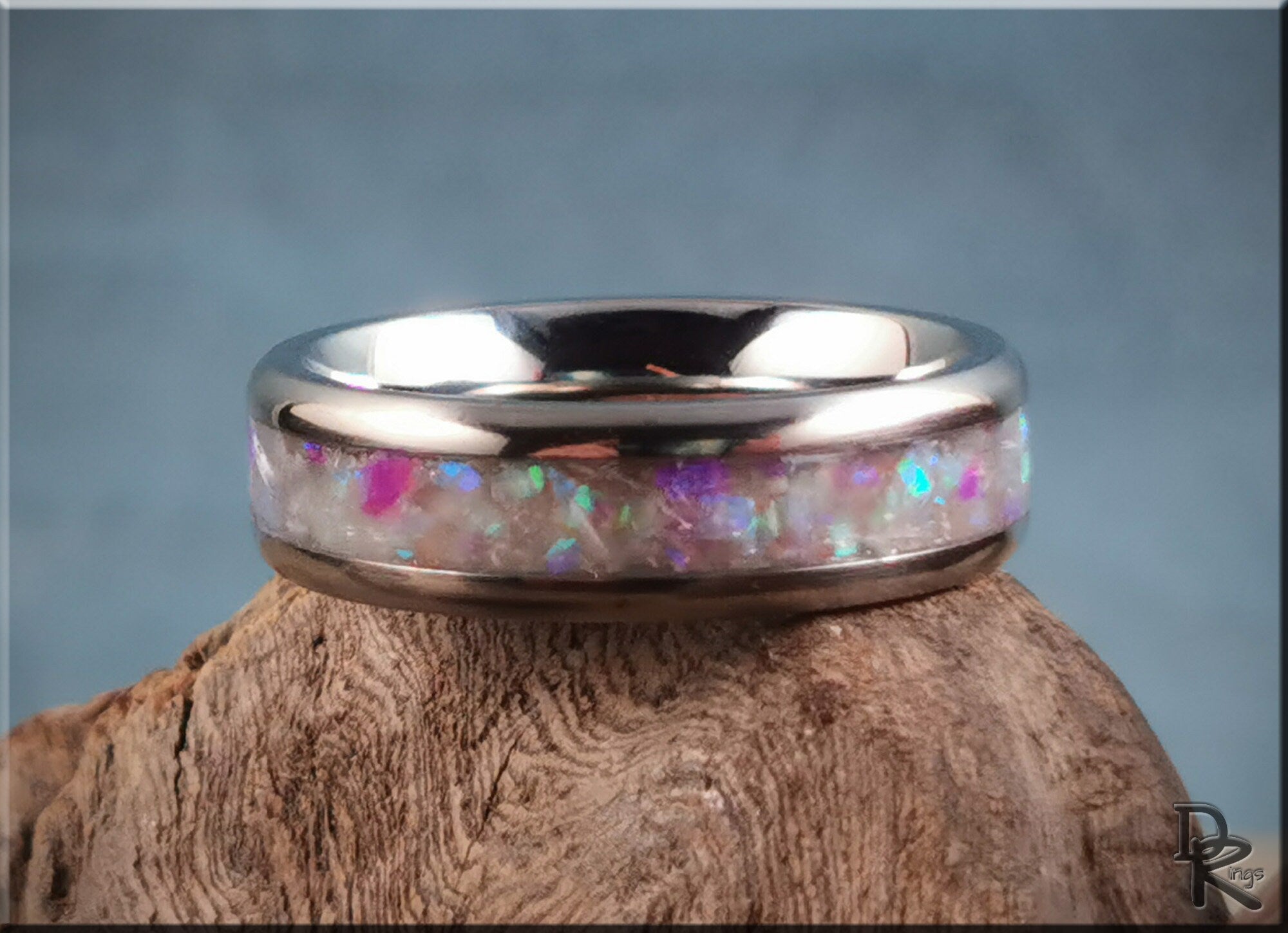 DR Rings titanium ring with inlay featuring colorful opal design set in polished metal band