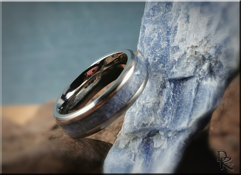DR Rings titanium ring with kyanite featuring a blue stone inlay and polished silver band