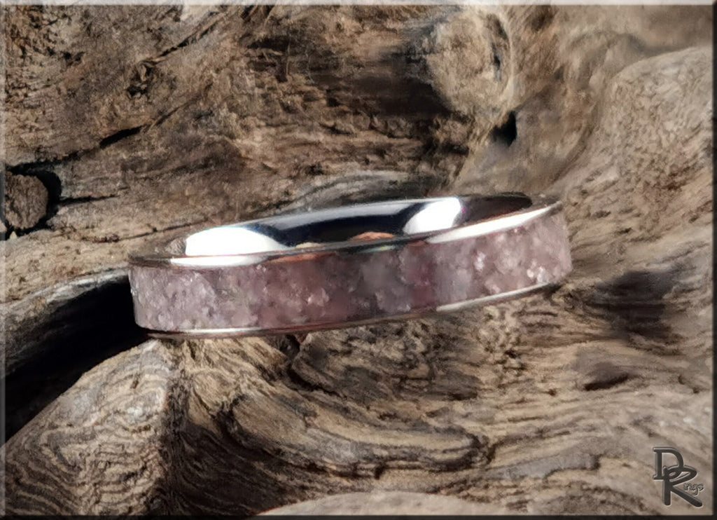 Titanium ring with lepidolite inlay by DR Rings on natural wood background