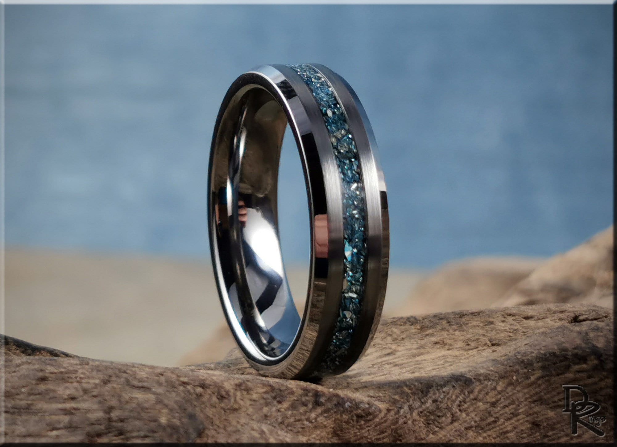 DR Rings tungsten as a ring with a blue crushed stone inlay on a polished silver band