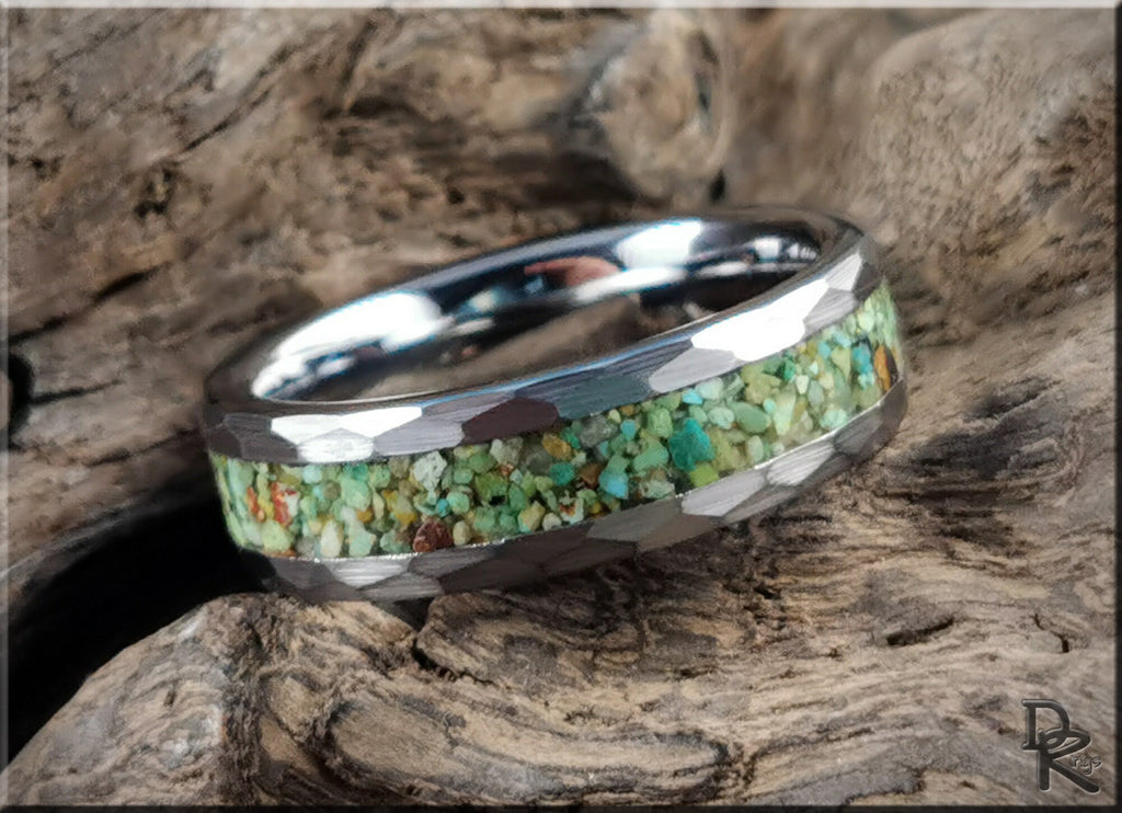 DR Rings tungsten as a ring with turquoise inlay and polished beveled edges on rustic wood