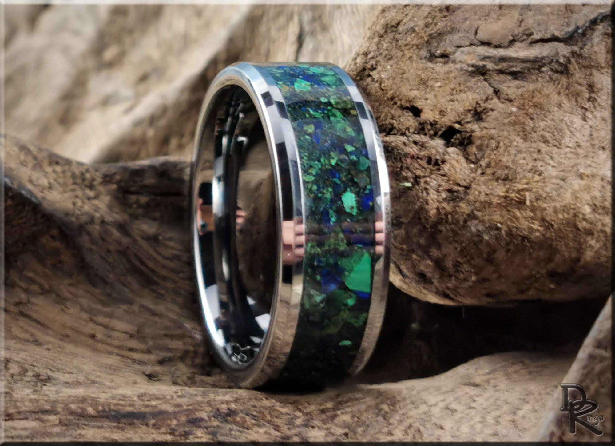 DR Rings tungsten ring carbide with blue and green inlay design on natural wood background
