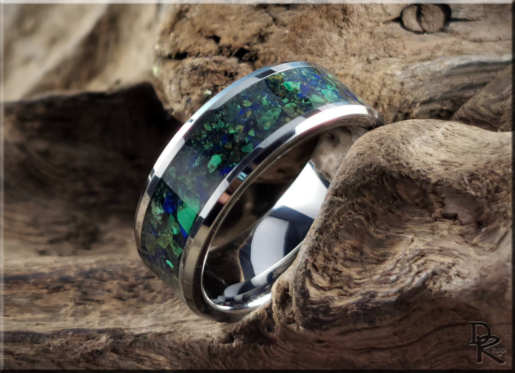 DR Rings tungsten ring carbide with blue and green inlay on natural wood background